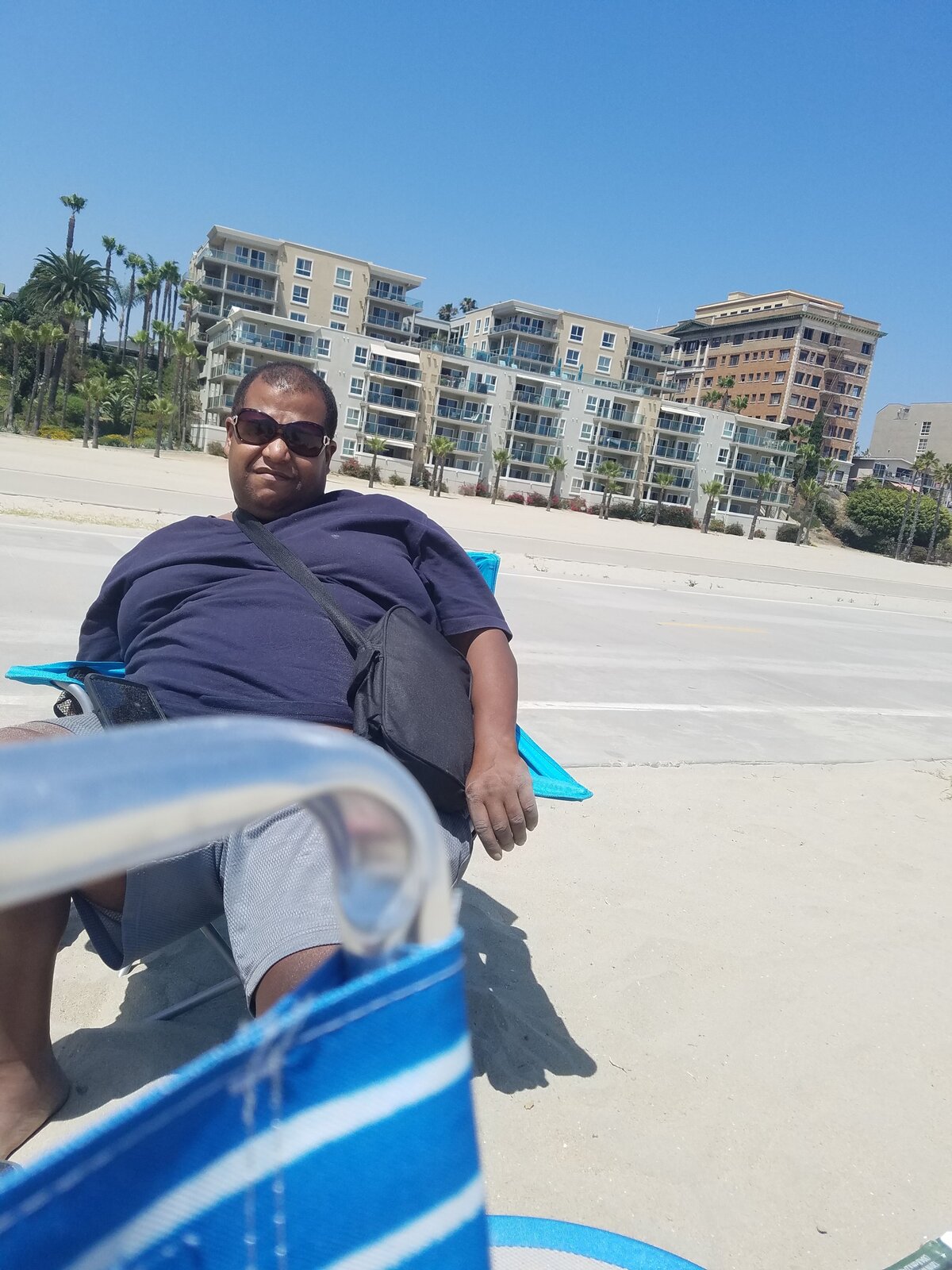 Rich seated in a beach chair at his heaviest weight, around 400 pounds